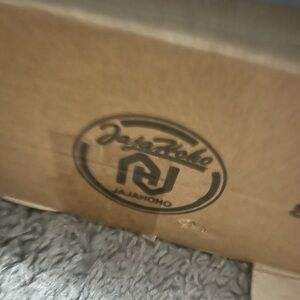 Jajahoho Gold shinny brand new in box never worn women’s roller skates.